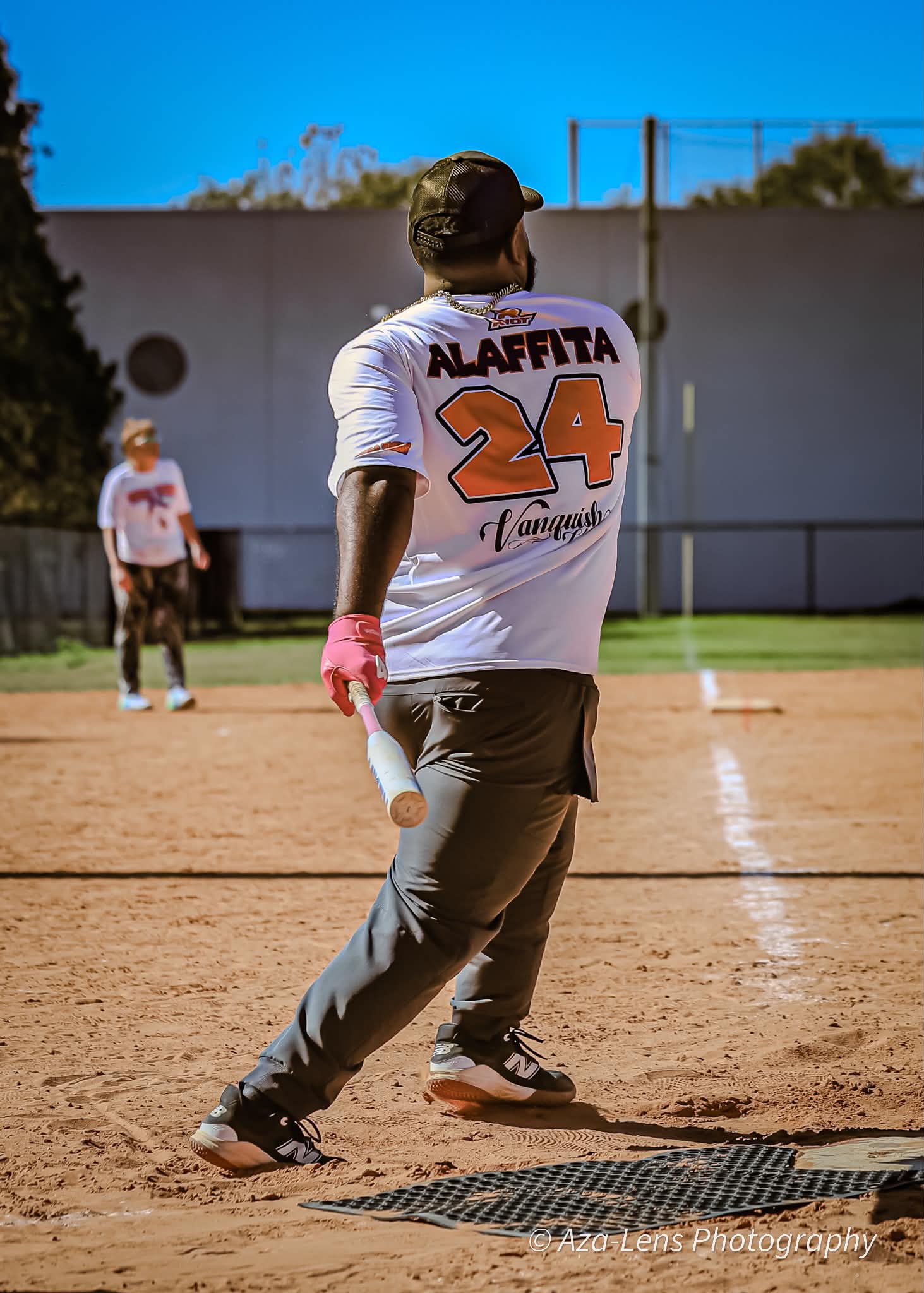 Player number 24 wearing Vanquish gear on the field
